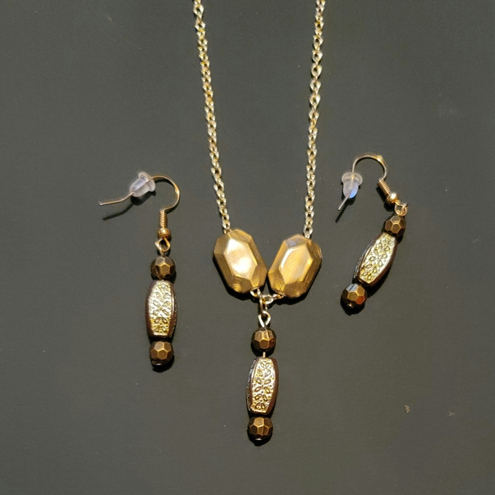 Brown and gold earrings and necklace